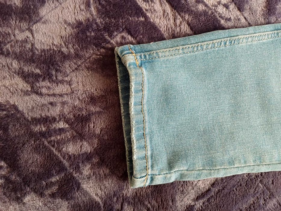 nowe jeansy Reserved jasny niebieski 44 slim high rise