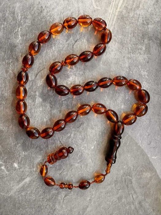 Piękny różaniec z bursztynu, Nowy