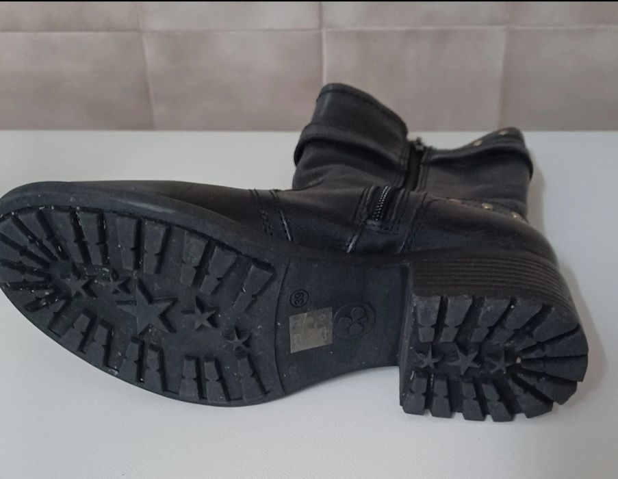 Botas pretas de couro