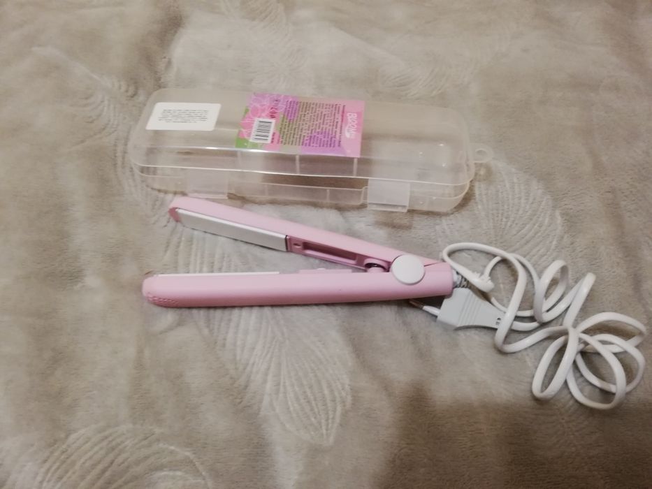 Вирівнювач для волосся