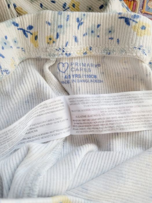 Spodnie 110 legginsy w prążek w kwiaty