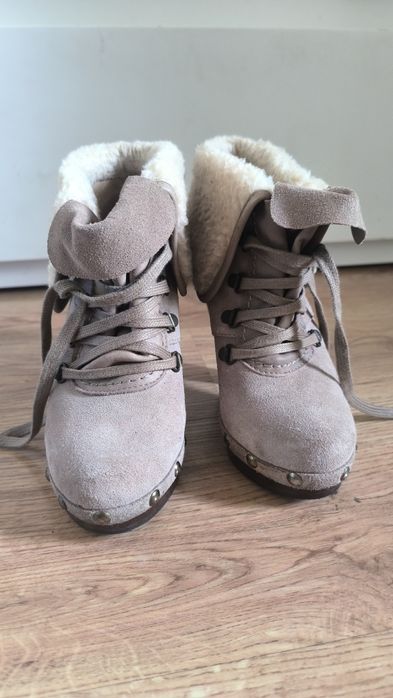 Botas de salto alto novas
