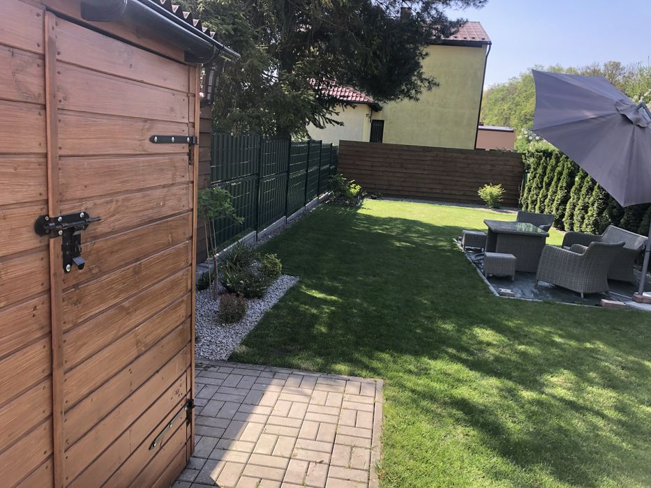 Na sprzedaz pól domu z ogrodem