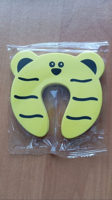 Дитячі стопори для дверей