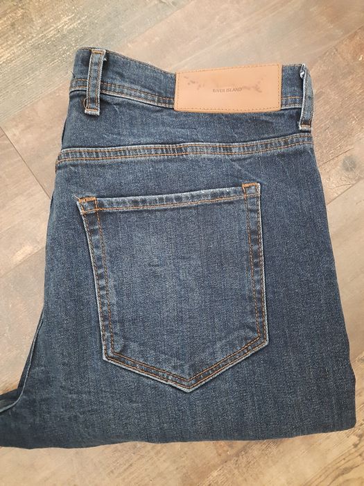 Jeansy męskie River Island