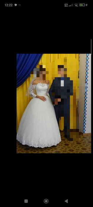 Весільня сукня ,