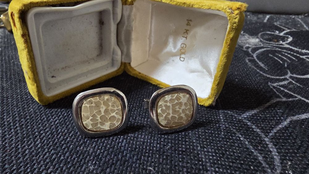 Botões de punho e alfinetes gravata