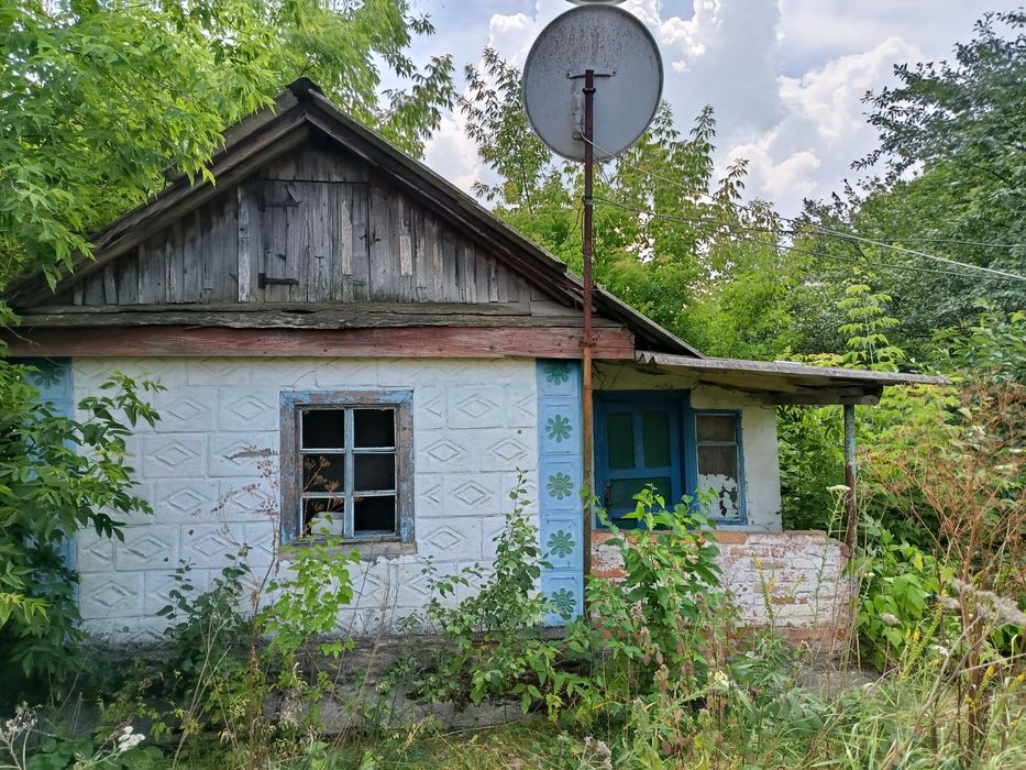 Будинок та земельна ділянка