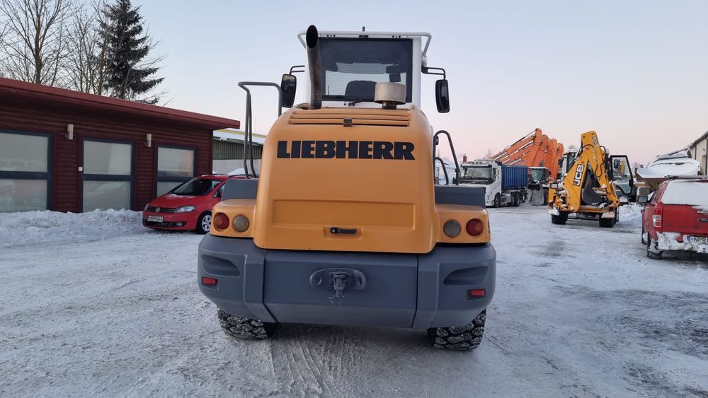 Фронтальный погрузчик Liebherr 528, 2011г