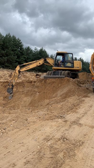 Usługi koparką, koparka-ładowarka