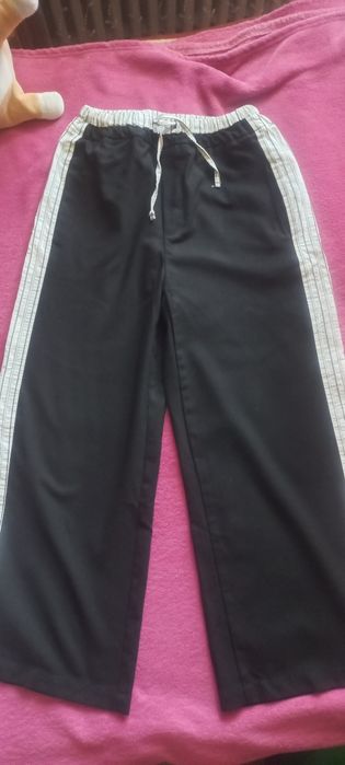 Брюки,штани Reserved на дівчинку зріст 146 см