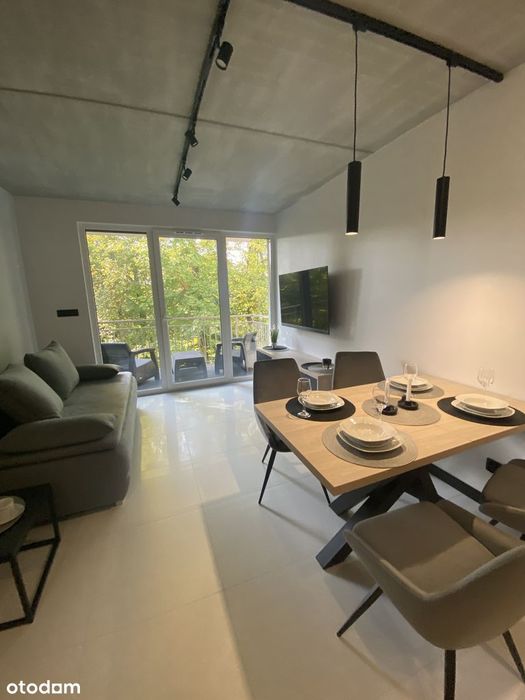 Nowoczesny 2-pok. apartament z balkonem, garażem podziemnym i komórką