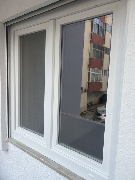 Janelas, porta e estores eletricos em pvc com oscilobatente e duplo vidro