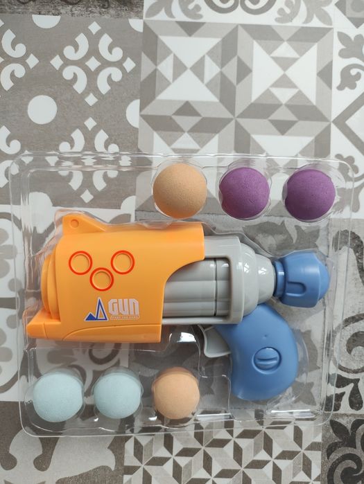 Пістолет іграшковий з кульками механічний