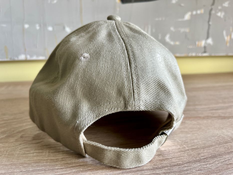 Boné estilo baseball em bege da Benetton