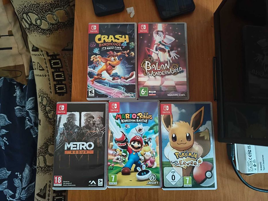 Nintendo Switch Lite + 5 ігор на картриджах