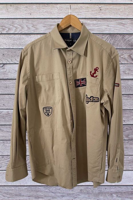 Sobrecamisa Lion of Porches