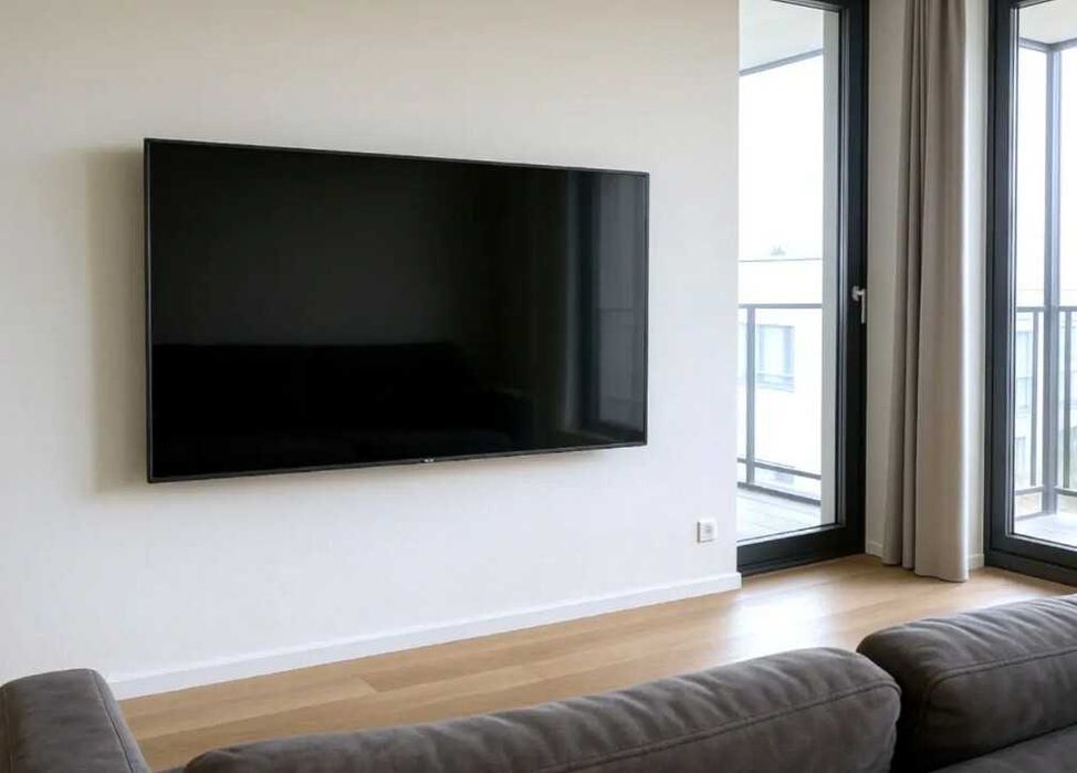 uchwyt TV na ścianie wieszanie telewizora Poznan i okolice