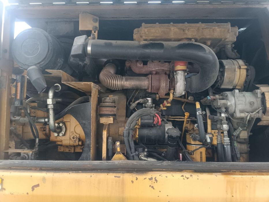 Екскаватор Caterpillar M312