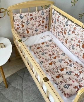 Бортики безпеки на дитяче ліжечко