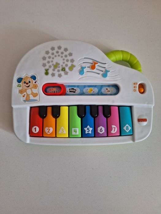 Fisher-Price Baby Музичне піаніно рос мова