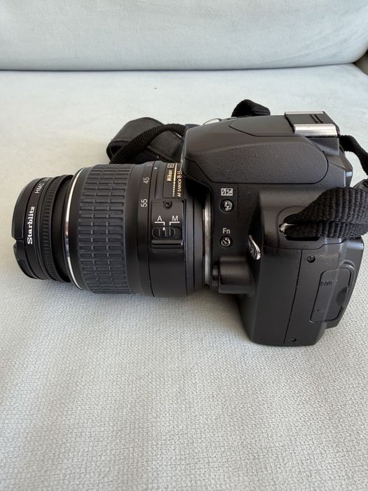 Nikon D60 + lente 18-55mm