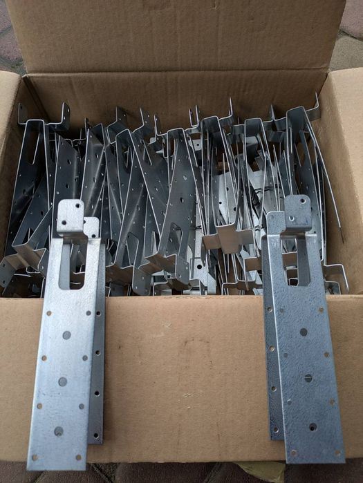 Кронштейн кріплення конькового бруса