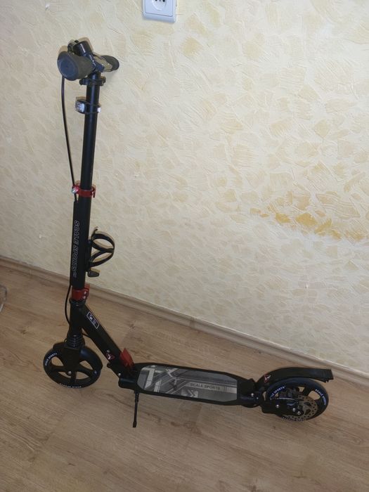 Продам самокат двухколесный "Scale Sports", до 100кг, тормоза дисковые