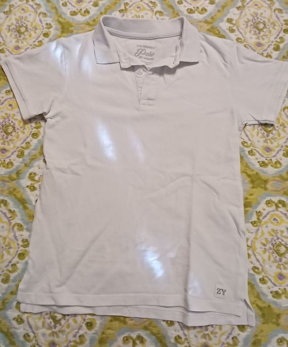 Polo branco criança 9-10 anos
