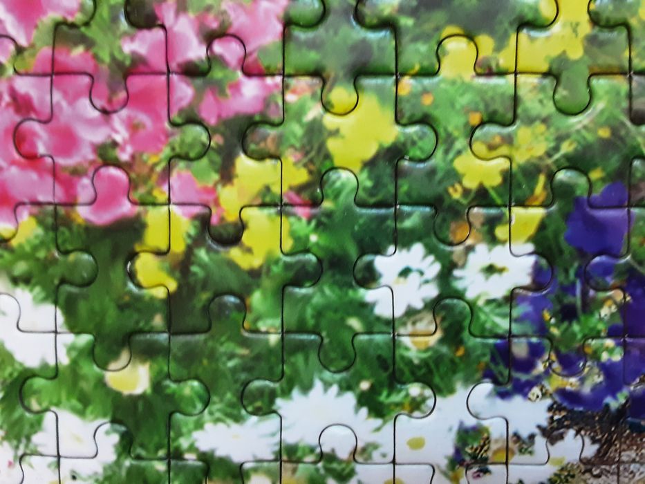 Puzzle 1000 " W ogrodzie "
