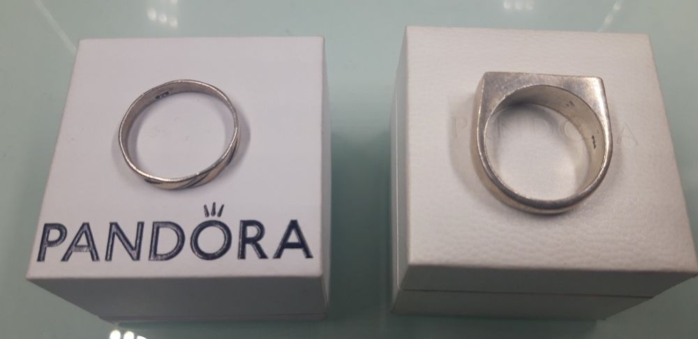 2 aneis de prata 925 ler discrição.