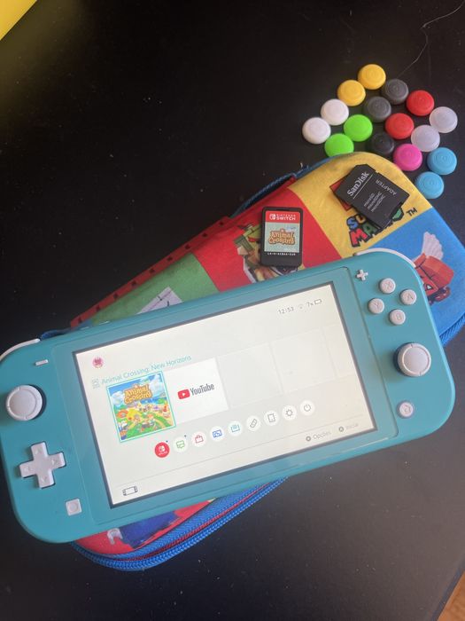 Nintendo Switch Lite + jogo Animal Crossing + sd card
