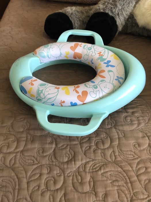 Redutor de sanita para crianças