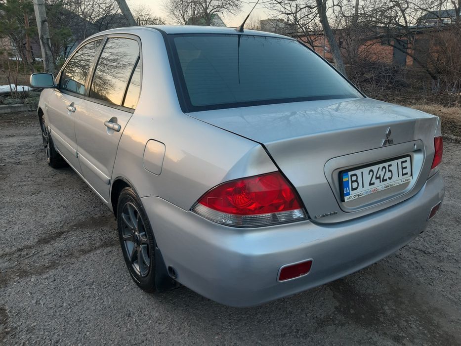 Мітцубісі Ланцер  9 з газом 4.