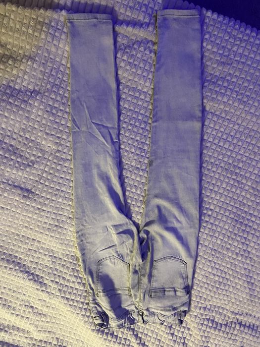 Spodnie z dziurami bershka
