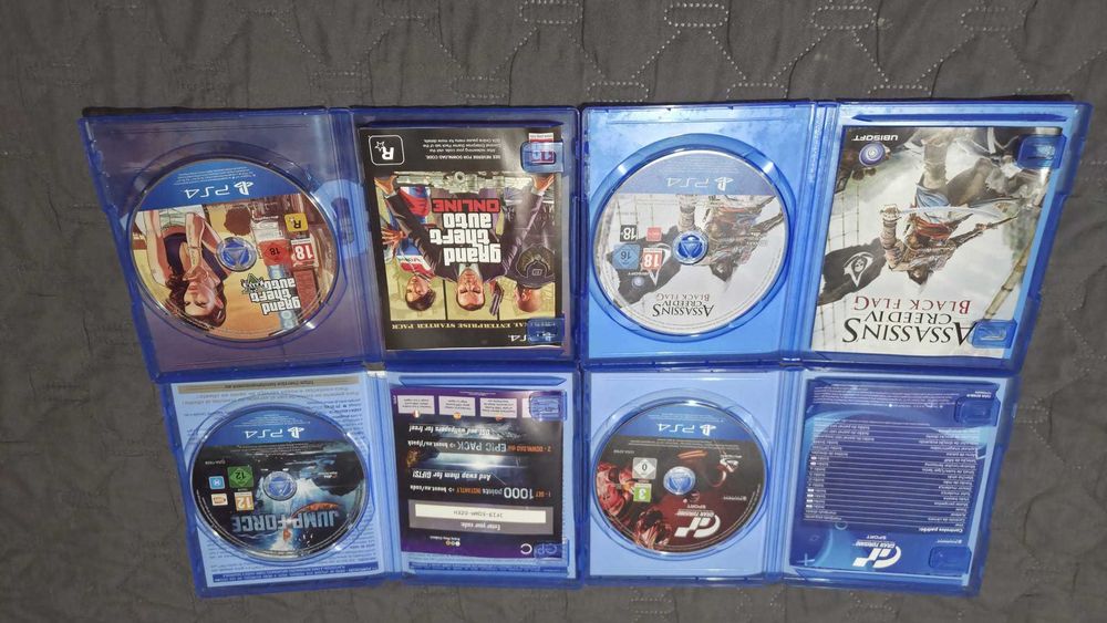 PS4 Pro + 2 Comandos + 7 Jogos + Base de Carregamento