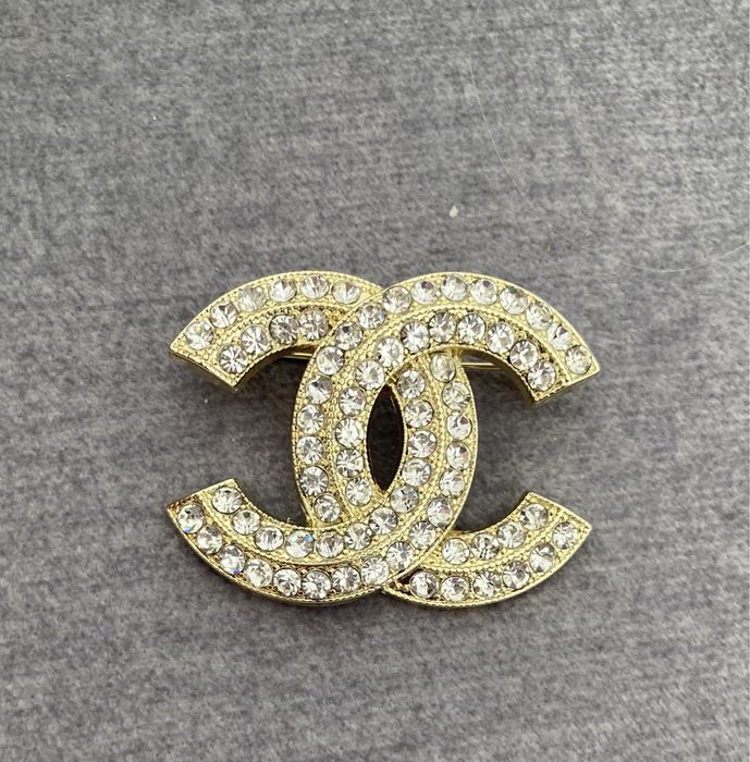 Broszka cc cyrkonia złota