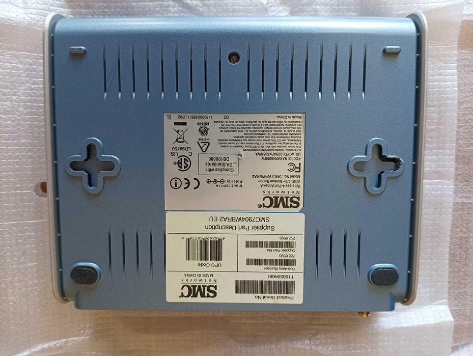 Router Modem ADSL 2+, Marca SMC, e Pen Wireless USB