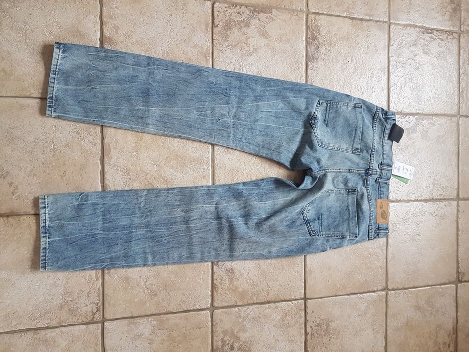 Nowe męskie spodnie Reserved rozmiar 33