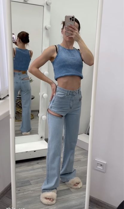 Джинси сині із замочками кльош труби дешево