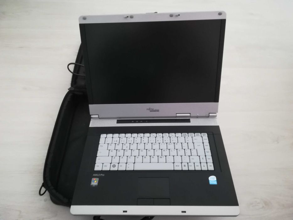 Portátil avariado com mala/pasta