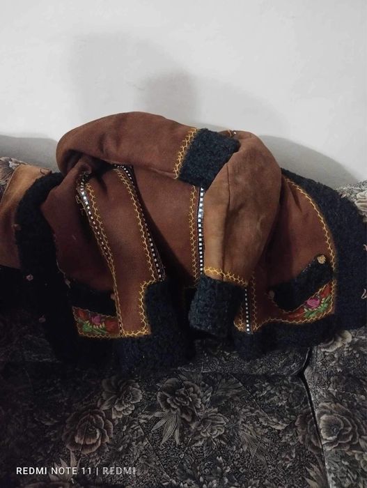 Кептар,кожуш та постоли.