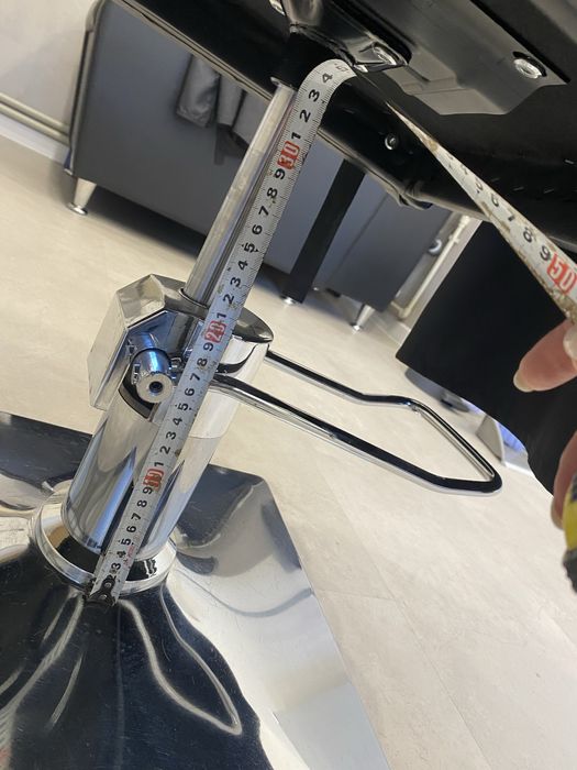 Гідравлічний підйомник для перукарського крісла