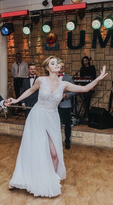 Delikatna, zwiewna Suknia ślubna