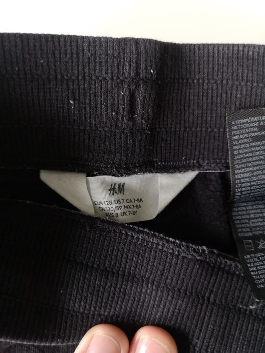 Grube czarne dresy h&m 128 cm.