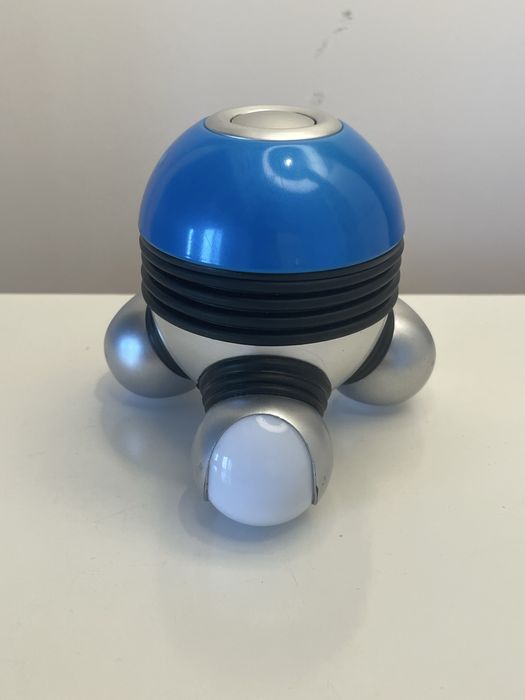 Máquina de massagens vibratória portátil