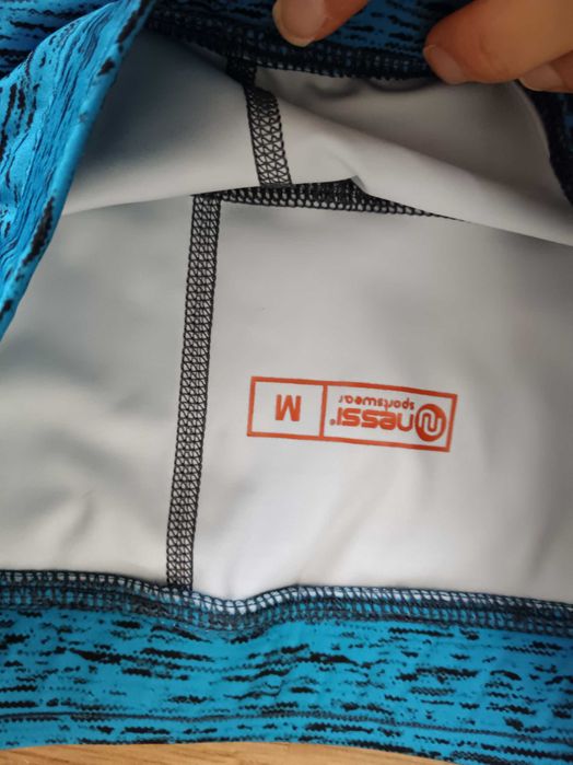 Krótkie legginsy biegowe Nessi