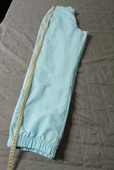 Piękne błękitne spodnie adidas 40