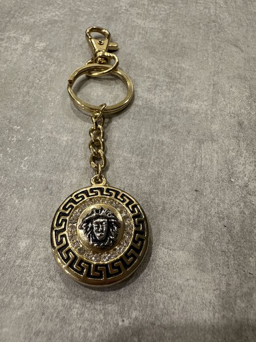 brelok z głową versace