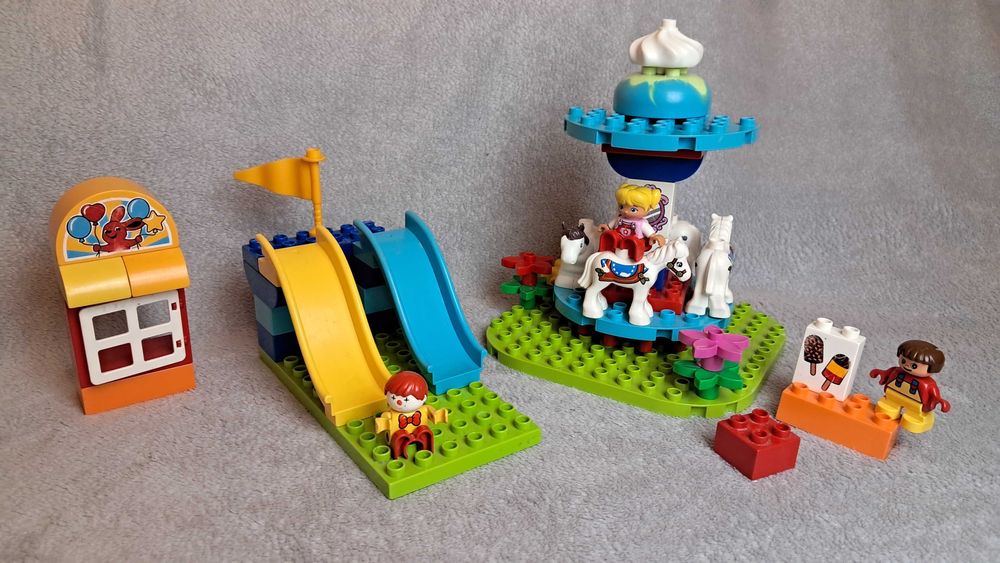 LEGO DUPLO 10841 Wesołe miasteczko + 6 figurek + karuzela